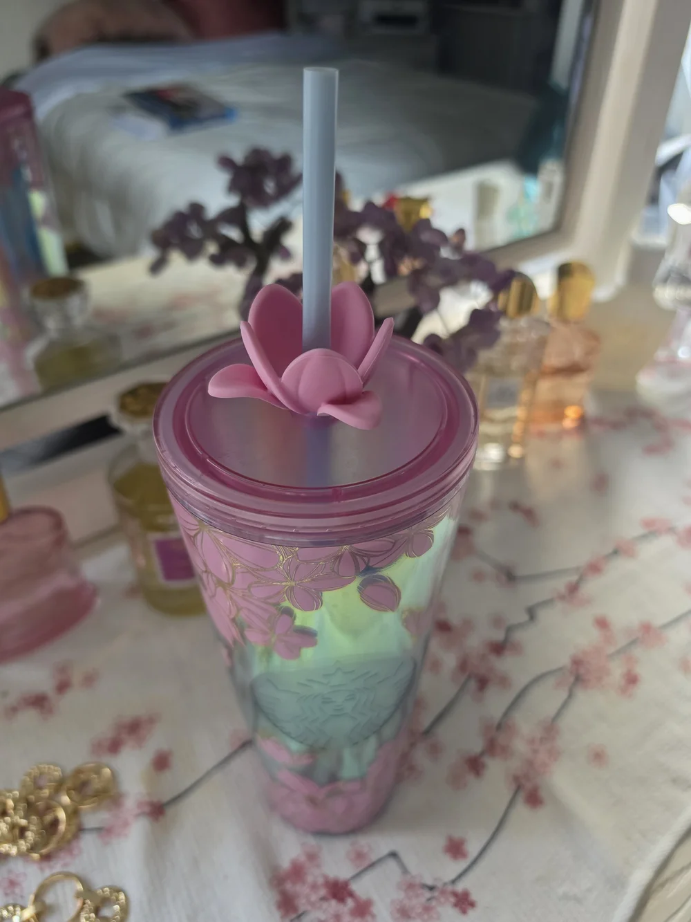 Pink Starbucks Cherry Blossom cold cup featuring an iridescent finish